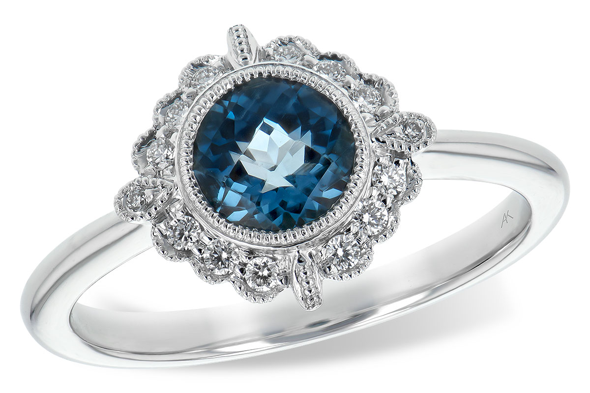 A216-92213: LDS RG .93 BLUE TOPAZ 1.05 TGW